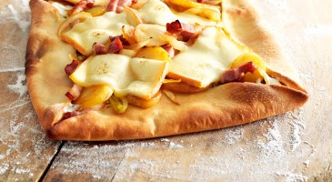 Gourmet pizza: Potato, bacon and raclette cheese pizza